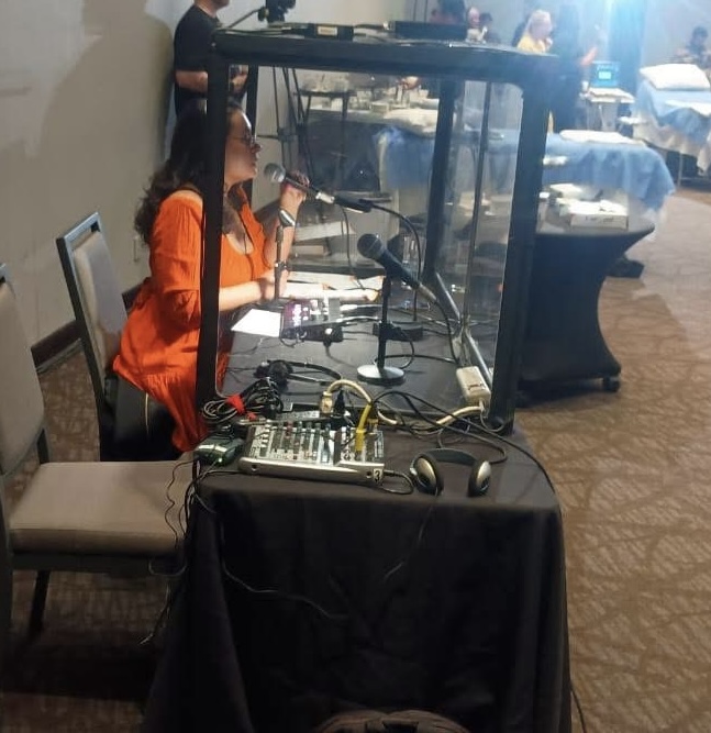 Interpreter at tabletop booth