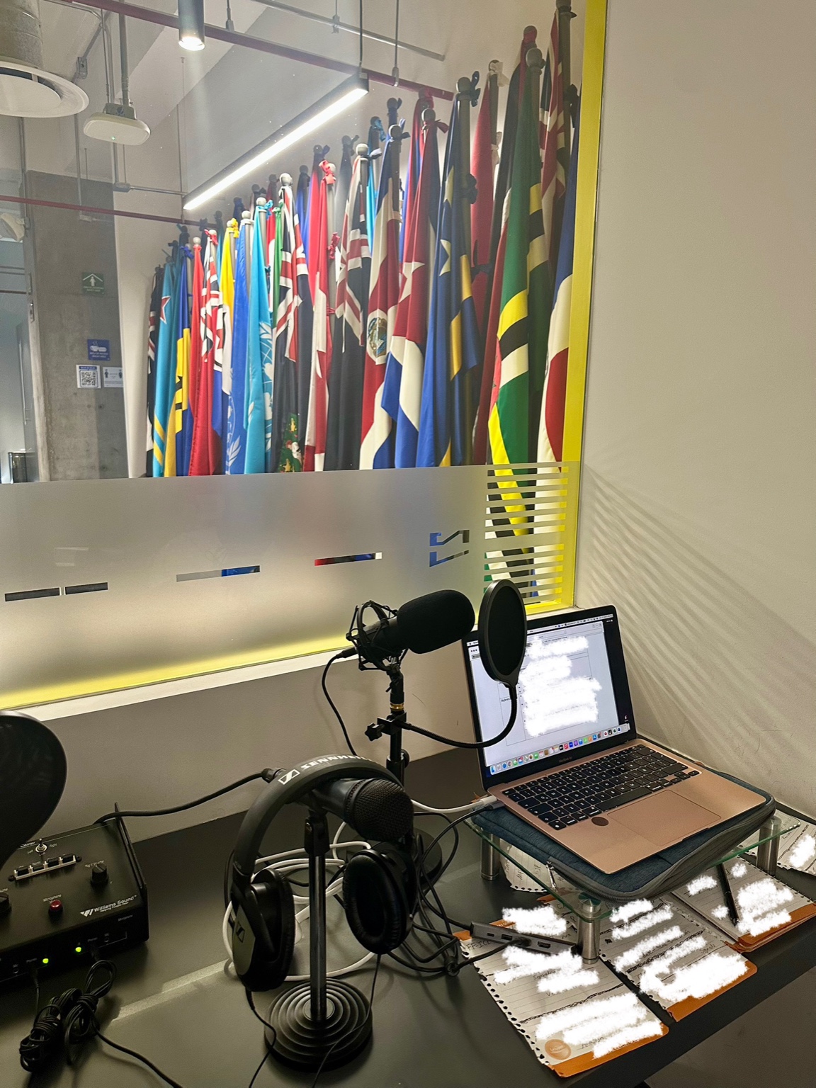 Studio with microphones and flags