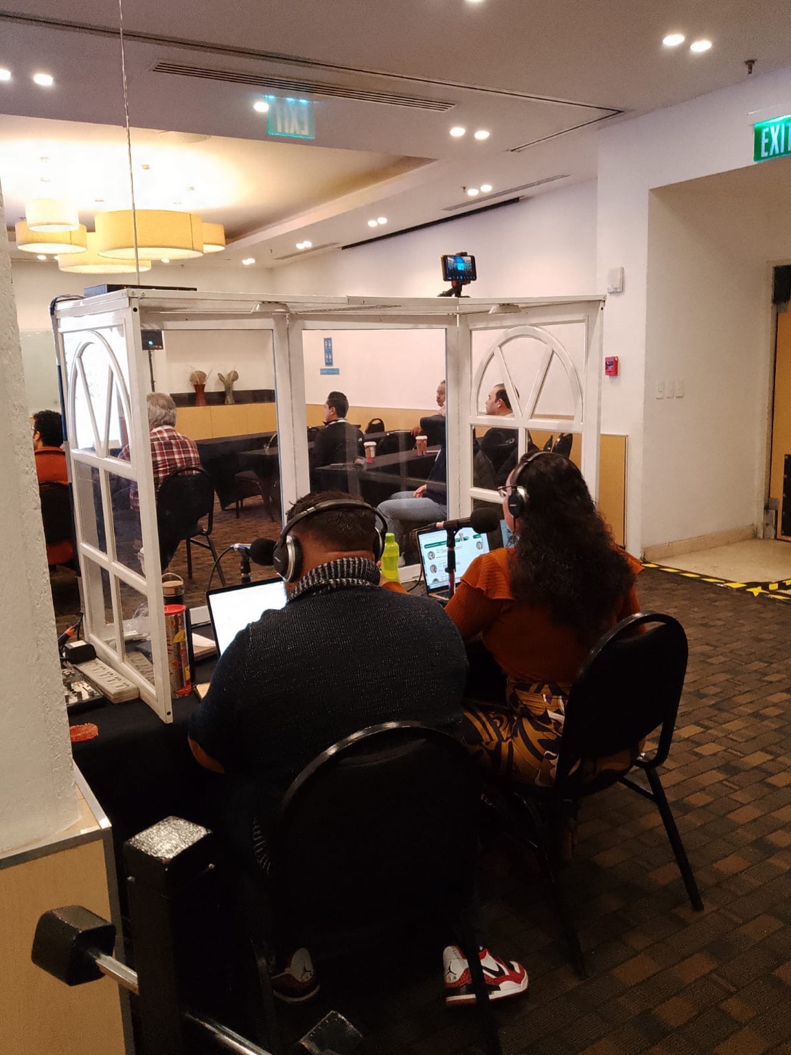 Interpreter at tabletop booth